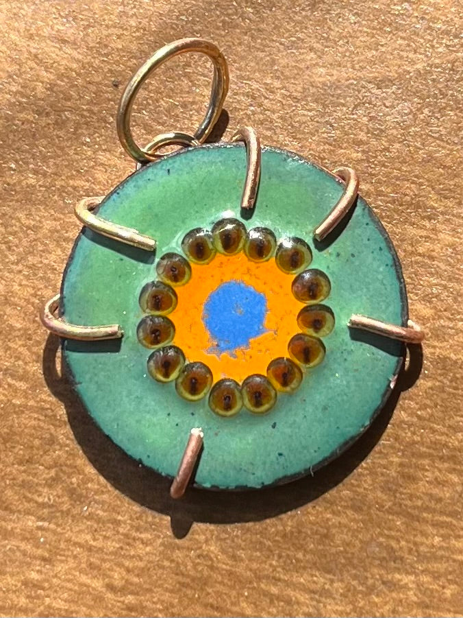 Circular kiwi pendant