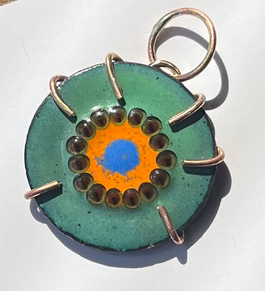 Circular kiwi pendant